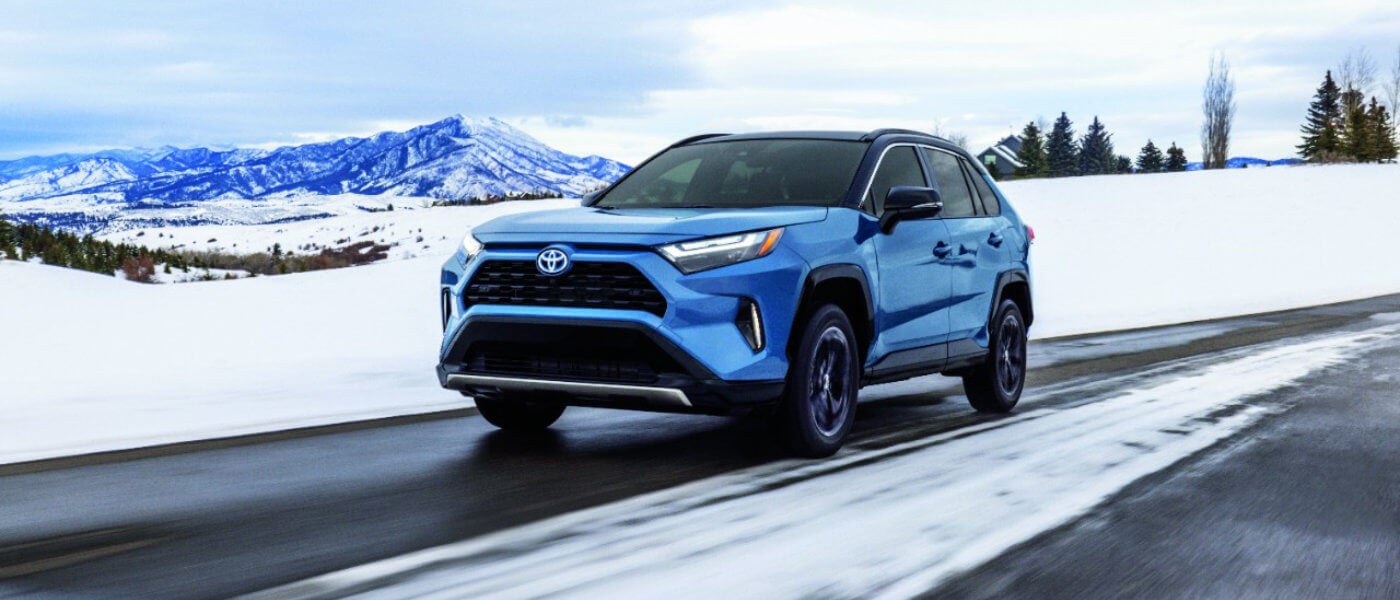 2024 Toyota RAV4 Hybrid Hybrid exterior snowy road