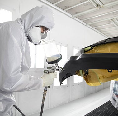 Collision Center Technician Painting a Vehicle | Continental Toyota in Hodgkins IL