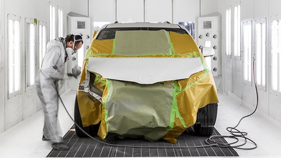Collision Center Technician Painting a Vehicle | Continental Toyota in Hodgkins IL