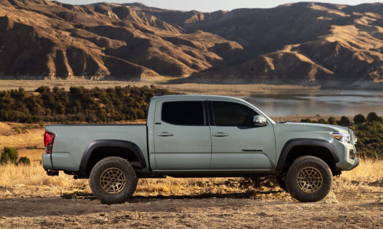 2023 Toyota Tacoma exterior at mountain lake