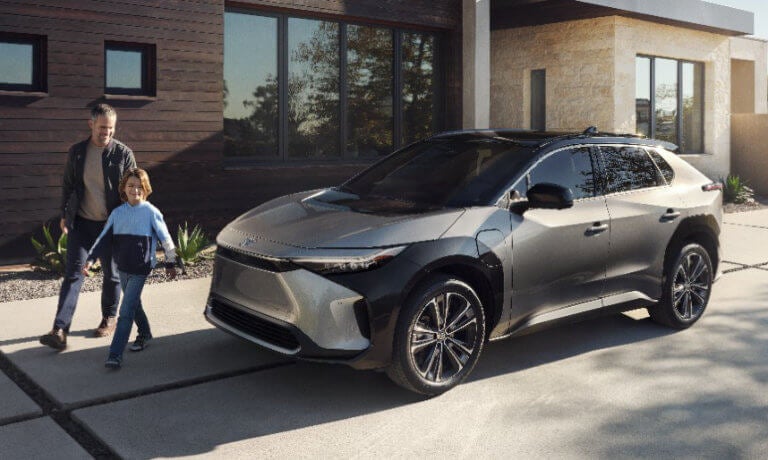 2023 Toyota bZ4X exterior outside home with parent and child